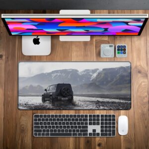 Defender Iceland Expedition desk mat — charcoal, stone and glacier grey design, available in M, L, XL and XXL sizes.