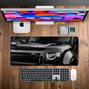 Defender Shadow Front desk mat — monochrome black and silver design, available in M, L, XL and XXL sizes.