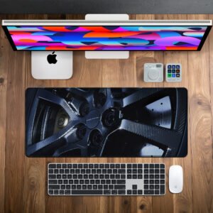Range Rover Carbon Forged Wheel desk mat — carbon black and gunmetal design, available in M, L, XL and XXL sizes.