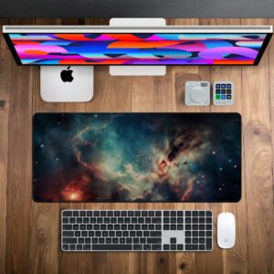 Celestial Nebula desk mat — teal, amber and deep space black design, available in M, L, XL and XXL sizes.