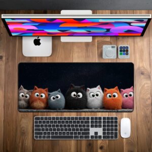 Fluffy Squad Night desk mat — black with grey, orange, white and pink design, available in M, L, XL and XXL sizes.