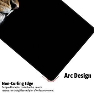 Midnight Lion desk mat — black and warm amber design, available in M, L, XL and XXL sizes.
