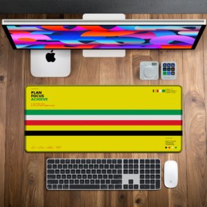 Sunset Stripe Amber Desk Mat — sunshine yellow, green, white, red and black design, available in M, L, XL and XXL sizes.