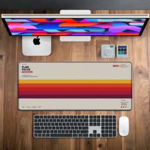 Sunset Stripe Classic Desk Mat — stone beige, mustard, amber and maroon design, available in M, L, XL and XXL sizes.
