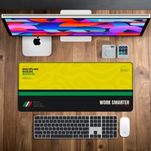 Swirl Motion Amber Desk Mat — sunshine yellow, forest green and black design, available in M, L, XL and XXL sizes.