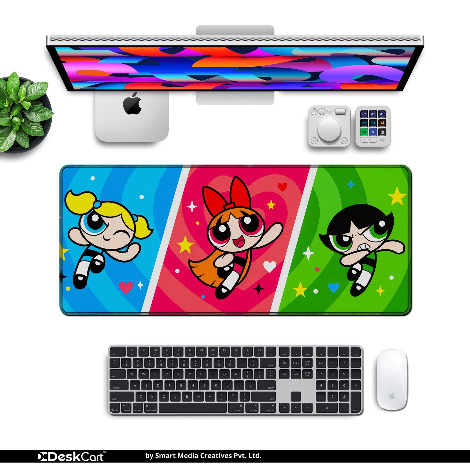 Super Trio Pop Desk Mat — blue, pink, green and yellow design, available in M, L and XL sizes. Super Trio Pop Desk Mat with keyboard and mouse on a desk